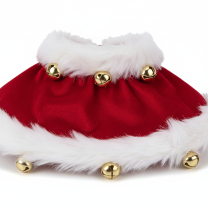 Close-up of pet Christmas outfit red velvet fabric and jingle bell decoration